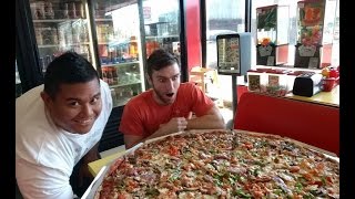 Giant 36quot Pizza Challenge at Champs Pizza amp Subs seen on Ginormous Food  Food Network [upl. by Negah76]