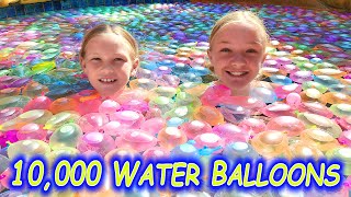 Filling Our Pool With 10000 Water Balloons [upl. by Blossom]