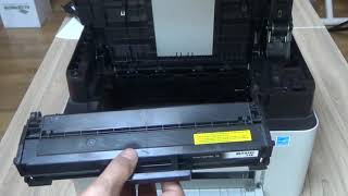 Samsung Xpress M2070 M2070W M2070F M2070FW  Replacing the Toner Cartridge [upl. by Ailssa]