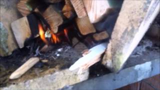 Rocket stove batch burner experiment [upl. by Ahsehat]