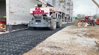 Rough terrain crane driving over GEOTERRA GTO Construction Mats at apartment complex [upl. by Redyr149]