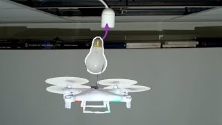 Replacing a lightbulb with a drone [upl. by Callas]