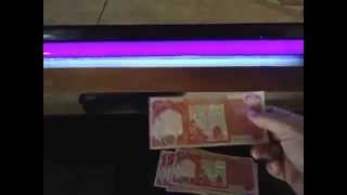 How to authenticate a 25000 Iraqi Dinar Bill at home [upl. by Giovanna636]