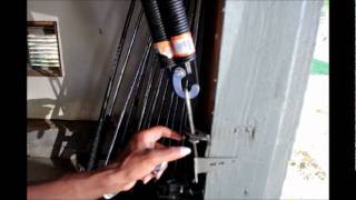 How to change the side spring on the garage door [upl. by Aissyla]