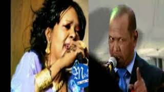 Sahra Axmed iyo Xasan Aadan  Heestii  Daauus  Lyrics  Mudug Boy [upl. by Sitto495]