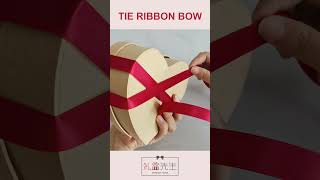 How to tie a ribbon on a heart shaped gift box shorts giftwrappingideas ribbonbow [upl. by Maureen]