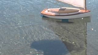 RC model Catboat chases its shadow [upl. by Oehsen]