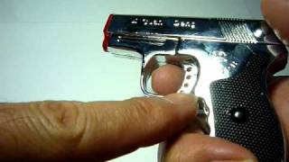 9mm HAND GUN REFILLABLE BUTANE TORCH LIGHTER with LASER POINTER [upl. by Ynnelg]