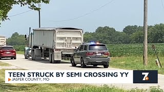 Teen stuck by semi crossing Route YY [upl. by Magdalene]