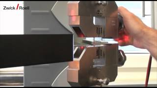 Tensile testing on micro dumbbells  Zugversuch an Miniaturschulterproben [upl. by Werdma504]