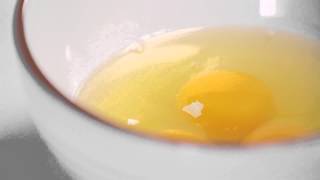 How to Crack an Egg Cleanly  Real Simple [upl. by Cavallaro]