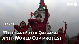 Red card for Qatar at Pariss antifootball World Cup  AFP [upl. by Eachelle999]