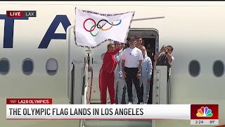 Watch the moment when the Olympic flag arrives in LA [upl. by Akcirderf]