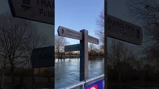 River Thames in full flow with Thames Path waymarker at Wolvercote heading towards Oxford river [upl. by Jephum]