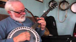 Tuning a banjo and adjusting the bridge placement [upl. by Hanima]