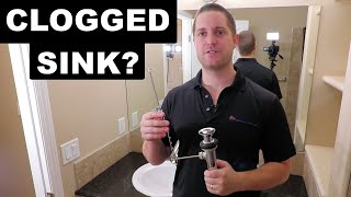 How to Unclog a Bathroom Sink [upl. by Ardnassak]