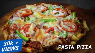 How to make Pizza with Pasta Base  Penne Pasta Pizza Recipe  Red Sauce Recipe [upl. by Hagile]