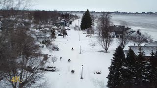 Canada Snowmobiles patrolling neighborhood streets after storm 12252022 [upl. by Eixel823]