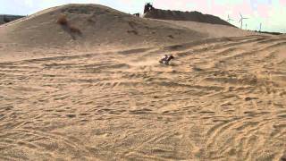 Traxxas ERevo Brushless 6S speed with big Air Jump in Gravel pit Sand pit [upl. by Ayhtin]