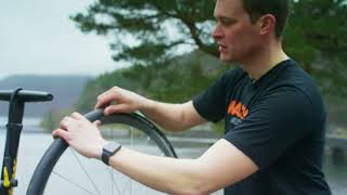 How to fit a tubeless road bike tyre [upl. by Marashio]