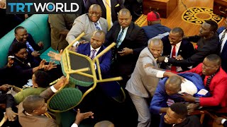 Uganda Politics MPs scuffle over presidential age limit debate [upl. by Silma221]