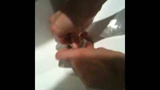 Removing a stuck sink stopper [upl. by Witty]