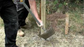 How to install a fence post into soil [upl. by Airdnalahs]