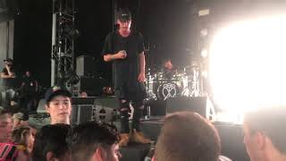 NF stops show to help a fan who passed out  on logics tour [upl. by Aztiraj56]