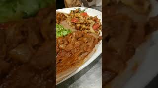 Ethiopian Food Injera Awaze Tibs  Goden Tibs Gomen [upl. by Neyugn]