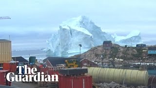 Huge iceberg threatens small Greenland village with tsunami [upl. by Elinnet]