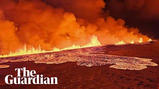 Aerial footage shows Iceland volcano spewing lava [upl. by Hcir739]