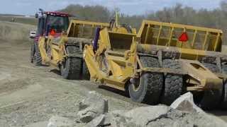 Case IH QuadTrac pulling KTec Scrapers [upl. by Brade]