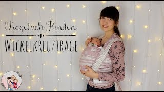 Tragetuch Binden WICKELKREUZTRAGE Neugeborenes Baby  Anleitung [upl. by Ecinuahs]