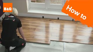 How to lay flooring part 3 laying locking laminate [upl. by Acinet]