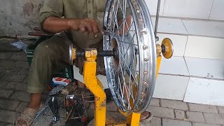 How to spoke a motorcycle wheel [upl. by Boy]