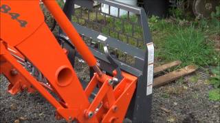 Demonstrating a Kubota quick attach loader [upl. by Huxham]