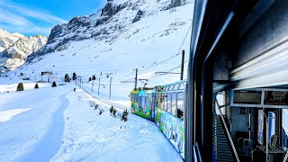 Riding a train in the Swiss Alps in winter ❄️ Grindelwald 4K 🇨🇭 [upl. by Aisetal932]