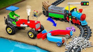 Diy tractor making mini tractor to make a magnet to attract railway  Diy safety traffic lights [upl. by Ahsit]