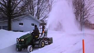 John Deere 1026R with a 48 inches frontier snowblower [upl. by Auqinaj627]