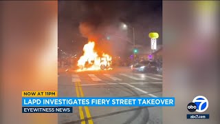 Jeep set on fire during chaotic street takeover in Los Angeles [upl. by Nuy]