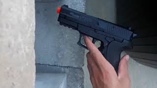 How to put co2 gas into your airsoft pistol small SIG SAUER SP2022 Airsoft co2 pistol review [upl. by Solegnave95]