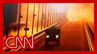 Surveillance footage captures large explosion on key bridge to Russianannexed Crimea [upl. by Eelan]