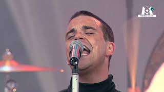 Robbie Williams à la première édition des Solidays  🤩  Extrait archives M6 Video Bank [upl. by Schroder]