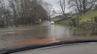 Driving though flood water at Wath near Pateley Bridge in February 2022 [upl. by Eneri]