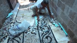 Traditional Greek pebblestone mosaic artist Stelios Grekos at work [upl. by Artimed316]