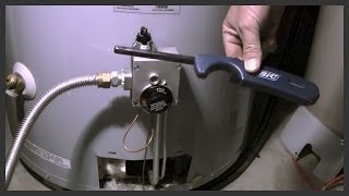 How to relight a water heater pilot light [upl. by Ymme]