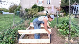 Inis Moestuin 34  Verhoogde moestuinbak maken en knoflook planten [upl. by Kraul]