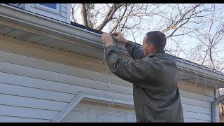 How to Hang Christmas and Holiday Lights on Gutters and Roof with Clips Icicle lights shown [upl. by Gustaf605]