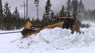 Plowing snow from roads in the spring in Yellowstone National Park [upl. by Lally]