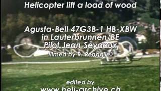 AgustaBell 47G3B1 HBXBW  Helicopter lift a load of wood [upl. by Rebeca]